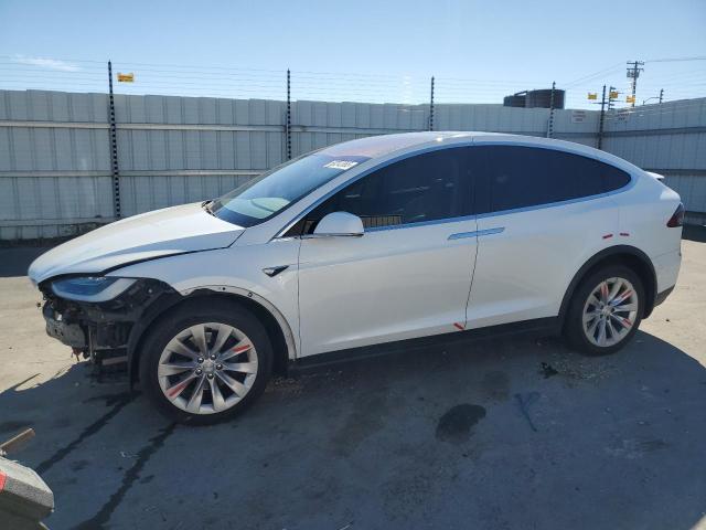 TESLA MODEL X 2018 with VIN 5YJXCDE27JF101482 - Photo from auction