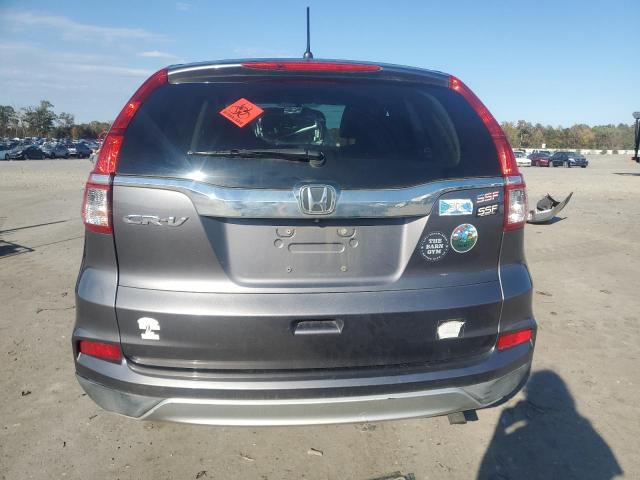 Photo 6 from auction – 2015 HONDA CR-V with VIN 2HKRM3H5XFH529643