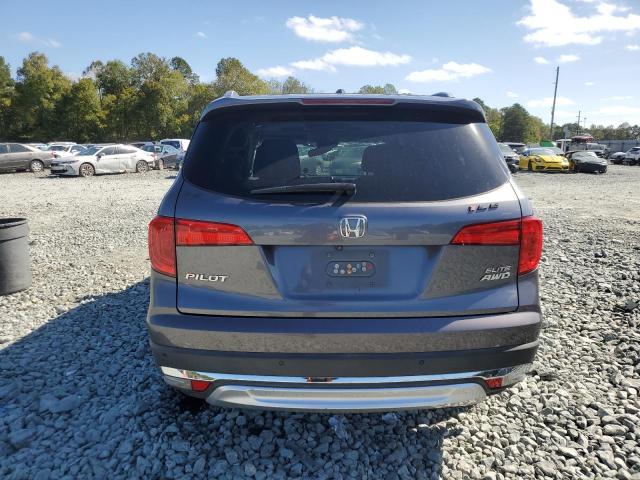 Photo 6 from auction – 2016 HONDA PILOT ELIT with VIN 5FNYF6H05GB050557