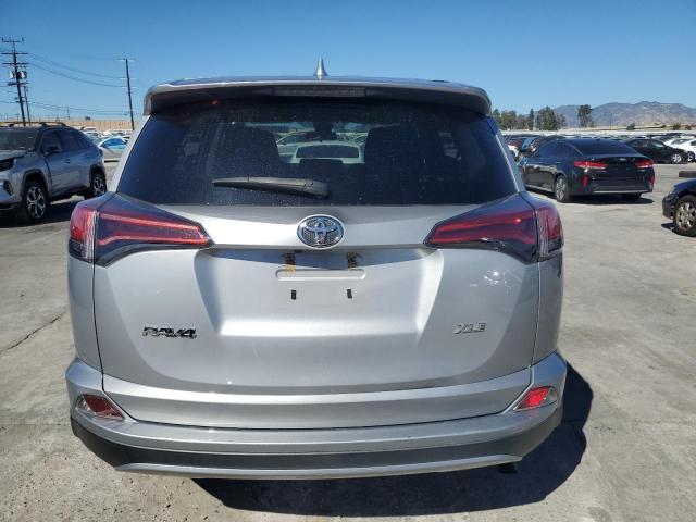Photo 6 from auction – 2018 TOYOTA RAV4 with VIN 2T3WFREV6JW473187