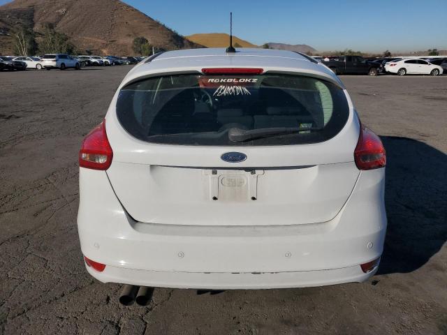 Foto 6 de la subasta – 2017 FORD FOCUS SEL con VIN 1FADP3M20HL245598