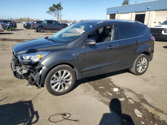 FORD ESCAPE TIT 2017 with VIN 1FMCU0JD7HUE05582 - Photo from auction