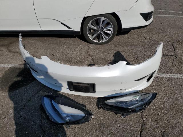 Photo 12 from auction – 2020 TESLA MODEL 3 with VIN 5YJ3E1EA0LF660020