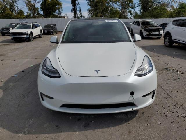 Photo 5 from auction – 2023 TESLA MODEL Y with VIN 7SAYGAEE1PF596629
