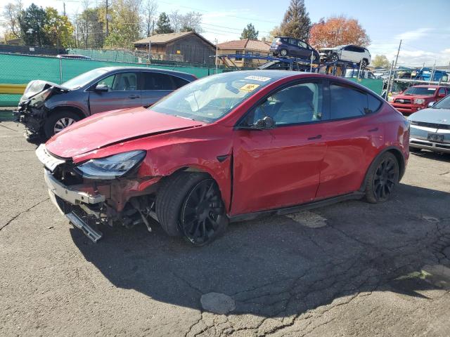 TESLA MODEL Y 2021 with VIN 5YJYGAEE0MF136628 - Photo from auction