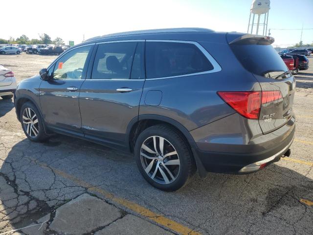 Photo 2 from auction – 2017 HONDA PILOT TOURING with VIN 5FNYF6H96HB012321