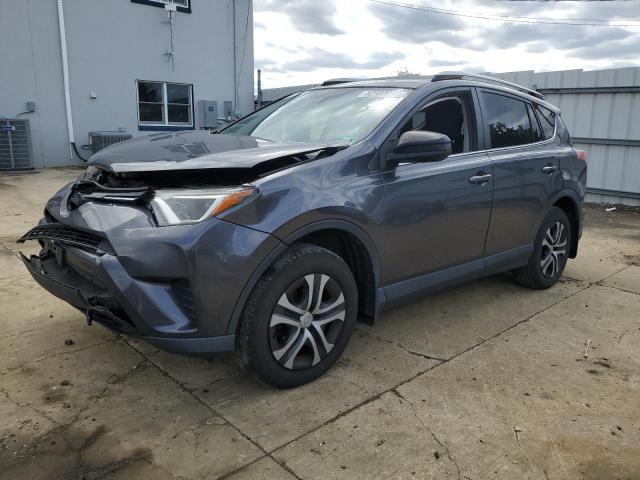 TOYOTA RAV4 LE 2018 with VIN JTMBFREV2JJ746042 - Photo from auction