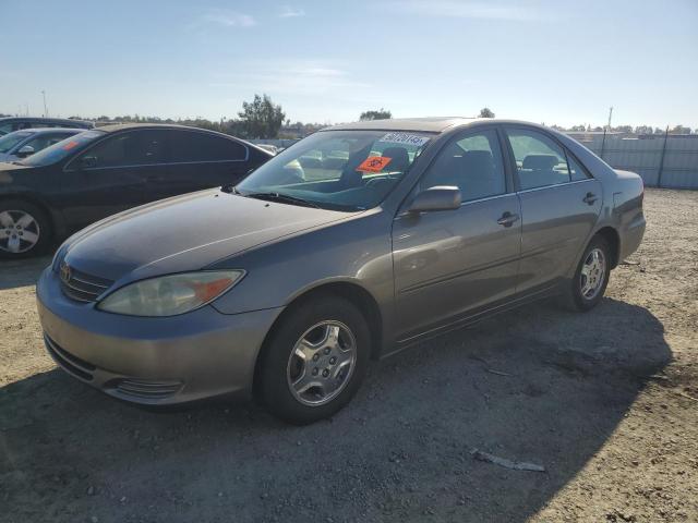 TOYOTA CAMRY LE 2002 with VIN 4T1BE32K32U582032 - Photo from auction
