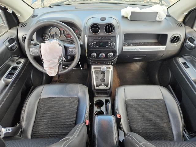 Photo 8 from auction – 2014 JEEP COMPASS LA with VIN 1C4NJDEB4ED646047