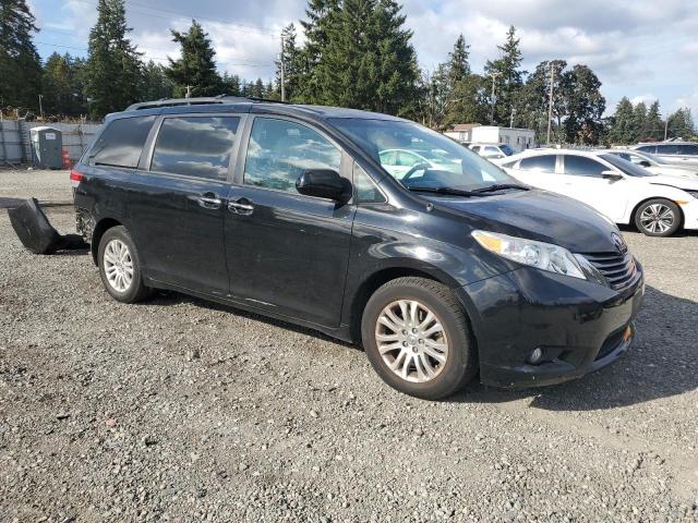 Photo 4 from auction – 2014 TOYOTA SIENNA XLE with VIN 5TDYK3DC0ES508153