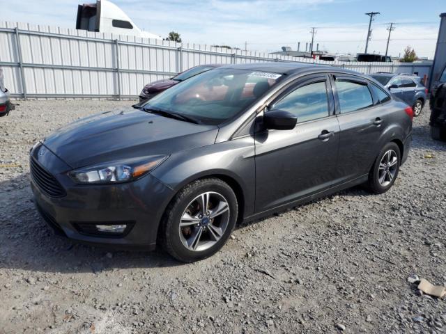 FORD FOCUS SE 2018 with VIN 1FADP3FE7JL278353 - Photo from auction