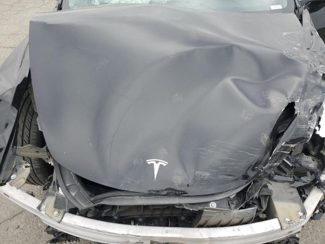 Photo 11 from auction – 2023 TESLA MODEL 3 with VIN 5YJ3E1EB1PF601265