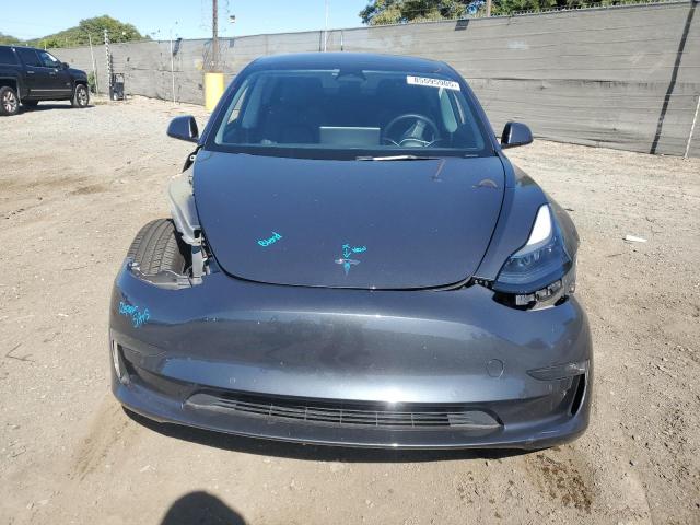 Photo 5 from auction – 2022 TESLA MODEL 3 with VIN 5YJ3E1EB4NF357317