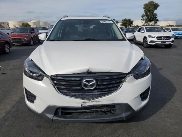 Photo 5 from auction – 2016 MAZDA CX-5 GT with VIN JM3KE2DY7G0915273