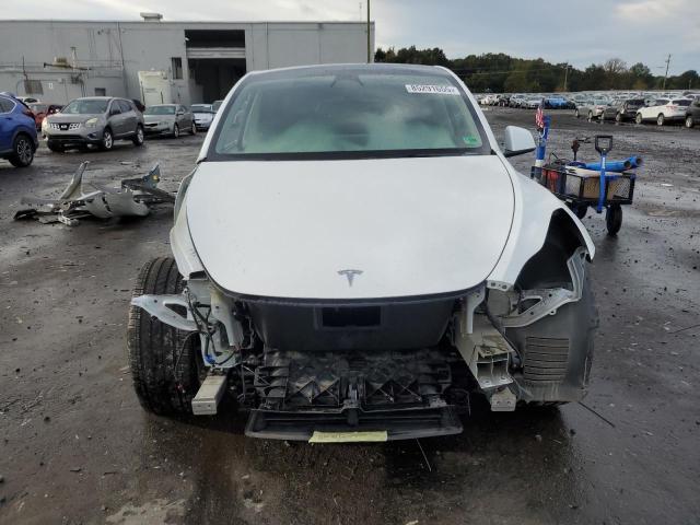 Photo 5 from auction – 2022 TESLA MODEL Y with VIN 7SAYGDEE8NF380520