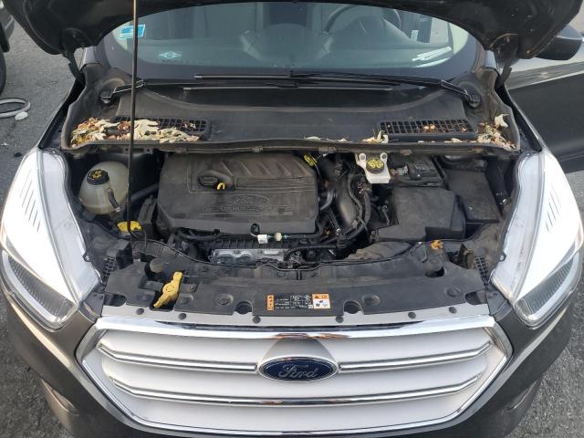 Photo 12 from auction – 2018 FORD ESCAPE SE with VIN 1FMCU9GD7JUD11848