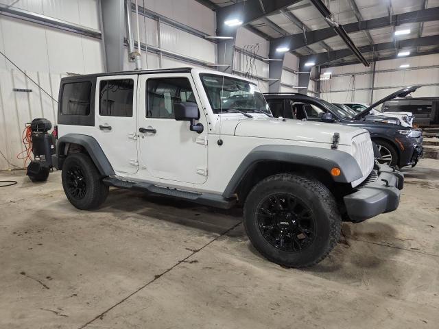 Photo 4 from auction – 2014 JEEP WRANGLER U with VIN 1C4BJWDG5EL113142