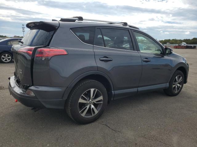 Photo 3 from auction – 2017 TOYOTA RAV4 XLE with VIN JTMRFREV0HJ129117