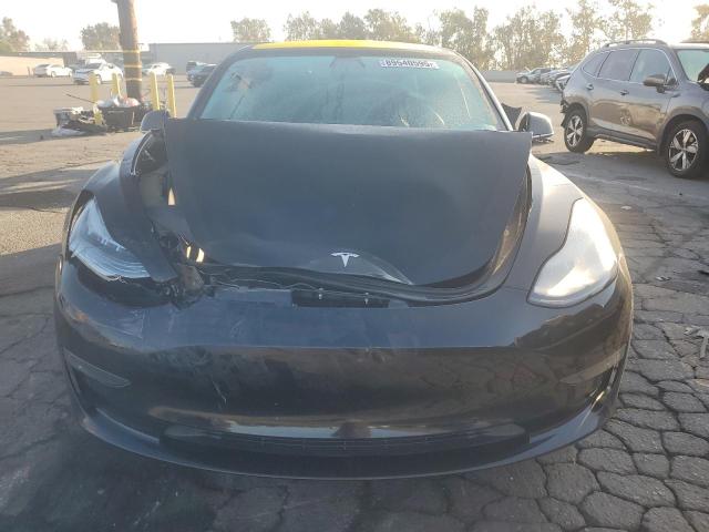 Photo 5 from auction – 2018 TESLA MODEL 3 with VIN 5YJ3E1EAXJF038084