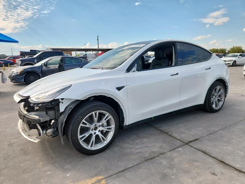 TESLA MODEL Y 2023 with VIN 7SAYGDEE1PA092791 - Photo from auction