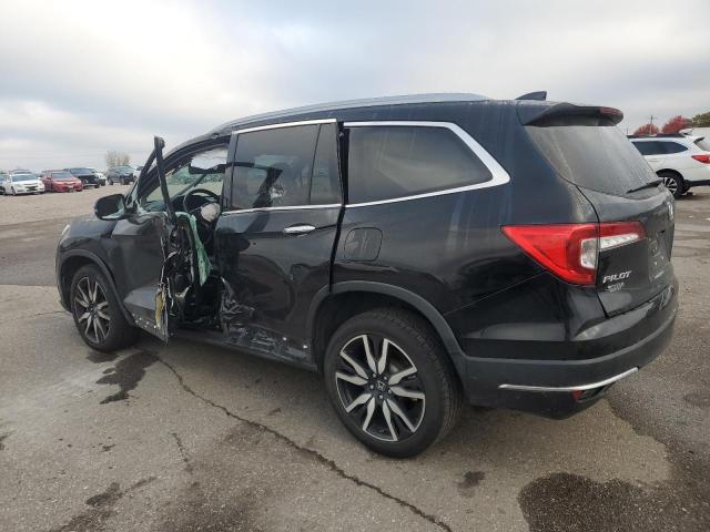 Photo 2 from auction – 2021 HONDA PILOT TOUR with VIN 5FNYF6H98MB090559