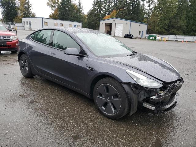 Photo 4 from auction – 2023 TESLA MODEL 3 with VIN 5YJ3E1EAXPF713408