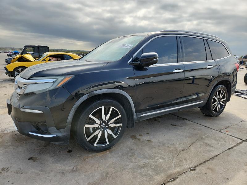 HONDA PILOT TOURING 2019 with VIN 5FNYF6H96KB019549 - Photo from auction
