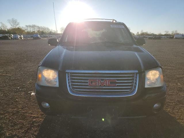 Photo 5 from auction – 2006 GMC ENVOY with VIN 1GKDT13S462148973