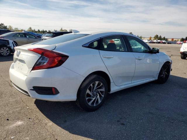 Photo 3 from auction – 2018 HONDA CIVIC EX with VIN 19XFC2F79JE028597