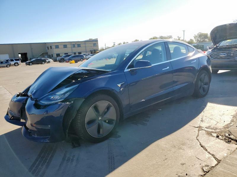 TESLA MODEL 3 2018 with VIN 5YJ3E1EAXJF034990 - Photo from auction