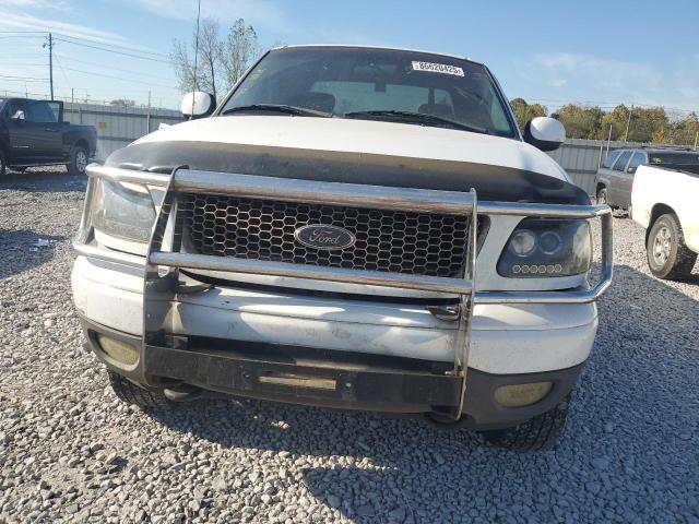 Photo 5 from auction – 2002 FORD F150 with VIN 1FTRX18L52NB15819