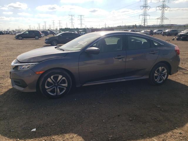 HONDA CIVIC LX 2018 with VIN 19XFC2F56JE033562 - Photo from auction