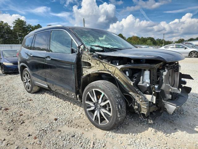 Photo 4 from auction – 2021 HONDA PILOT TOUR with VIN 5FNYF6H69MB059200