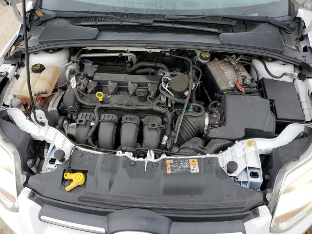 Photo 11 from auction – 2014 FORD FOCUS SE with VIN 1FADP3F22EL330970
