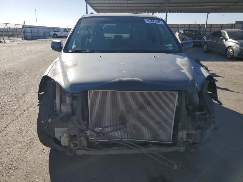 Photo 5 from auction – 2004 HONDA PILOT EX with VIN 2HKYF18454H516393
