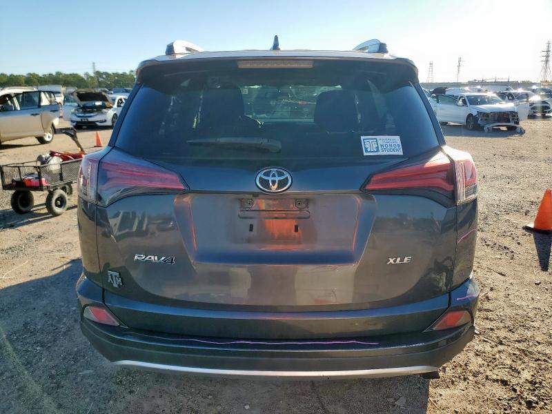 Photo 6 from auction – 2016 TOYOTA RAV4 XLE with VIN 2T3WFREV8GW266227