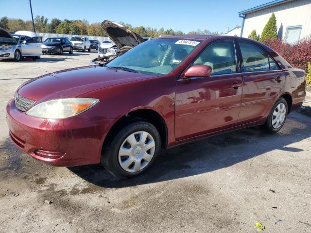 TOYOTA CAMRY LE 2002 with VIN JTDBE32K420004839 - Photo from auction