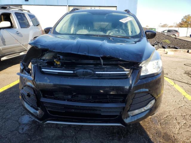 Photo 5 from auction – 2015 FORD ESCAPE SE with VIN 1FMCU9G99FUC87653