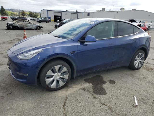 TESLA MODEL Y 2022 with VIN 7SAYGDEE0NF423988 - Photo from auction