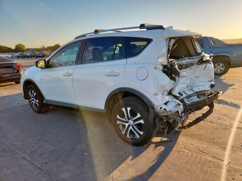 Photo 2 from auction – 2016 TOYOTA RAV4 LE with VIN JTMZFREV8GJ095362