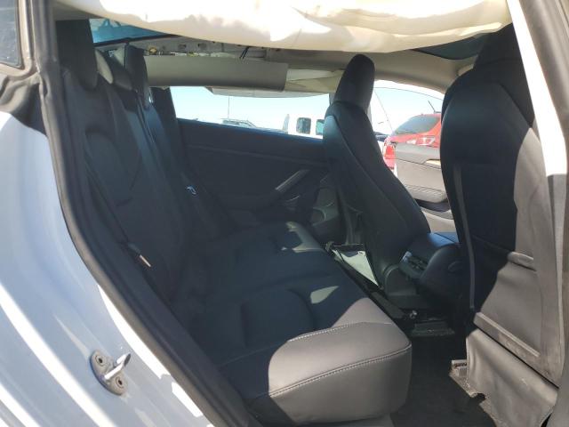 Photo 10 from auction – 2023 TESLA MODEL 3 with VIN 5YJ3E1EA9PF705557