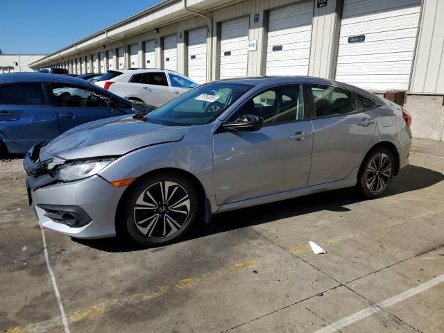HONDA CIVIC EX 2016 with VIN 19XFC1F3XGE004129 - Photo from auction