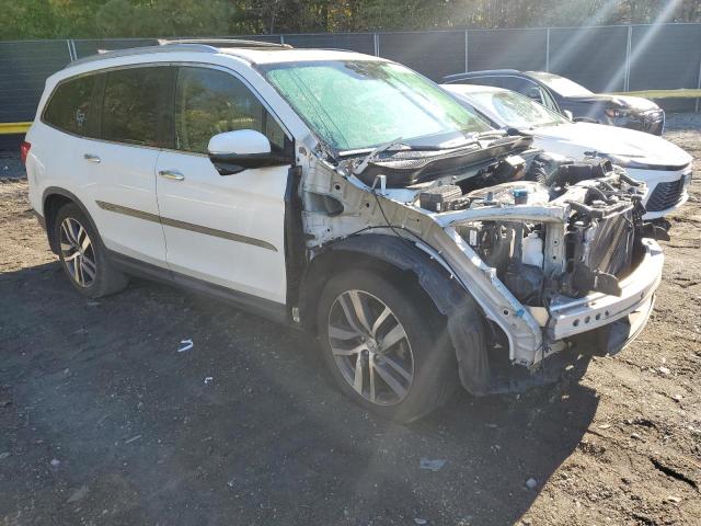 Photo 4 from auction – 2017 HONDA PILOT TOURING with VIN 5FNYF5H94HB013056