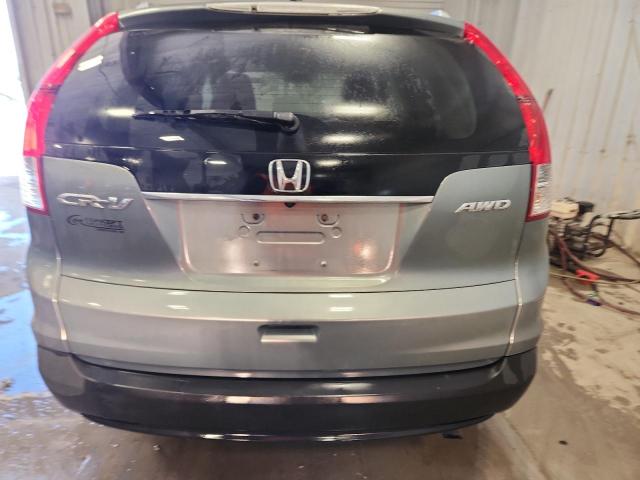 Photo 6 from auction – 2012 HONDA CR-V EXL with VIN JHLRM4H73CC014100