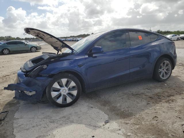TESLA MODEL Y 2023 with VIN 7SAYGDEE8PA111272 - Photo from auction
