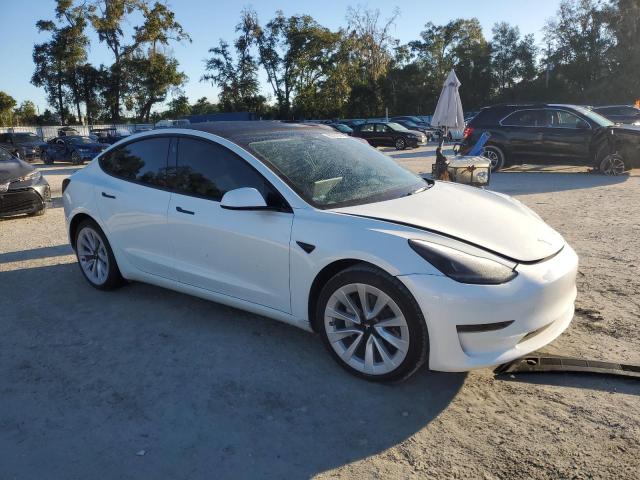 Photo 4 from auction – 2022 TESLA MODEL 3 with VIN 5YJ3E1EA3NF329032
