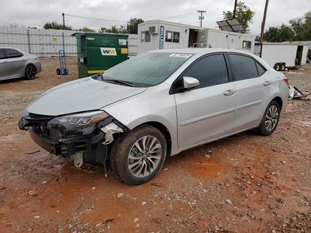 TOYOTA COROLLA L 2018 with VIN 5YFBURHE0JP799304 - Photo from auction