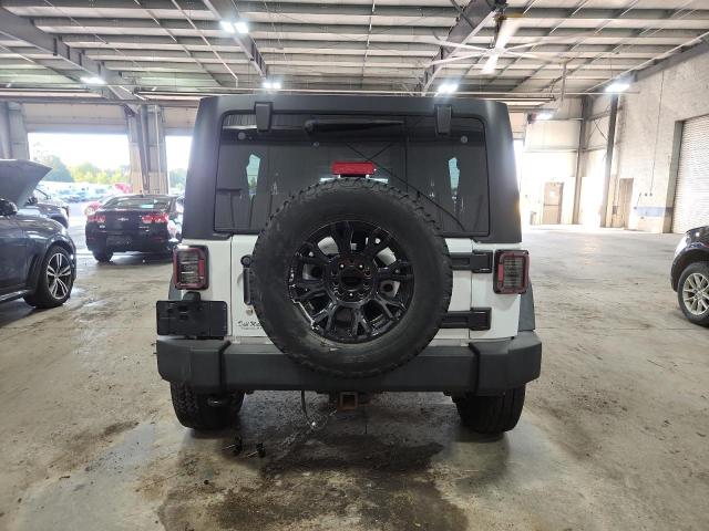Photo 6 from auction – 2014 JEEP WRANGLER U with VIN 1C4BJWDG5EL113142