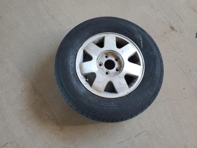 Photo 13 from auction – 2003 KIA SEDONA EX with VIN KNDUP131836492933