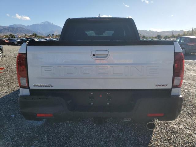 Photo 6 from auction – 2024 HONDA RIDGELINE with VIN 5FPYK3F12RB010095